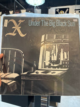 X - Under the Sun
